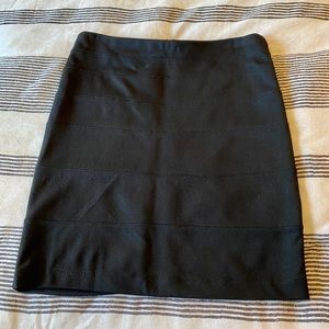 Black zip back mini skirt